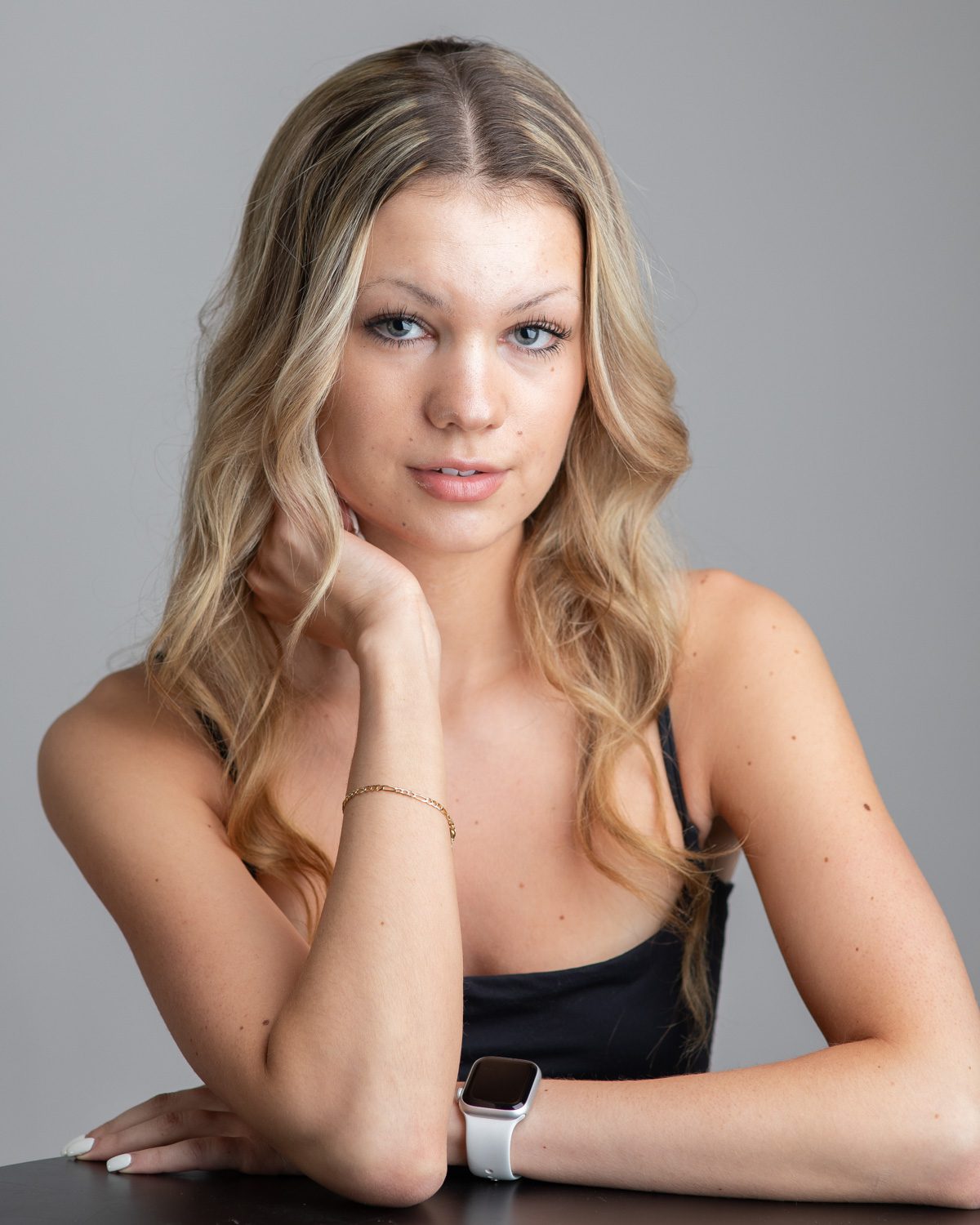 Pretty woman posing for her modeling headshot for a casting call.