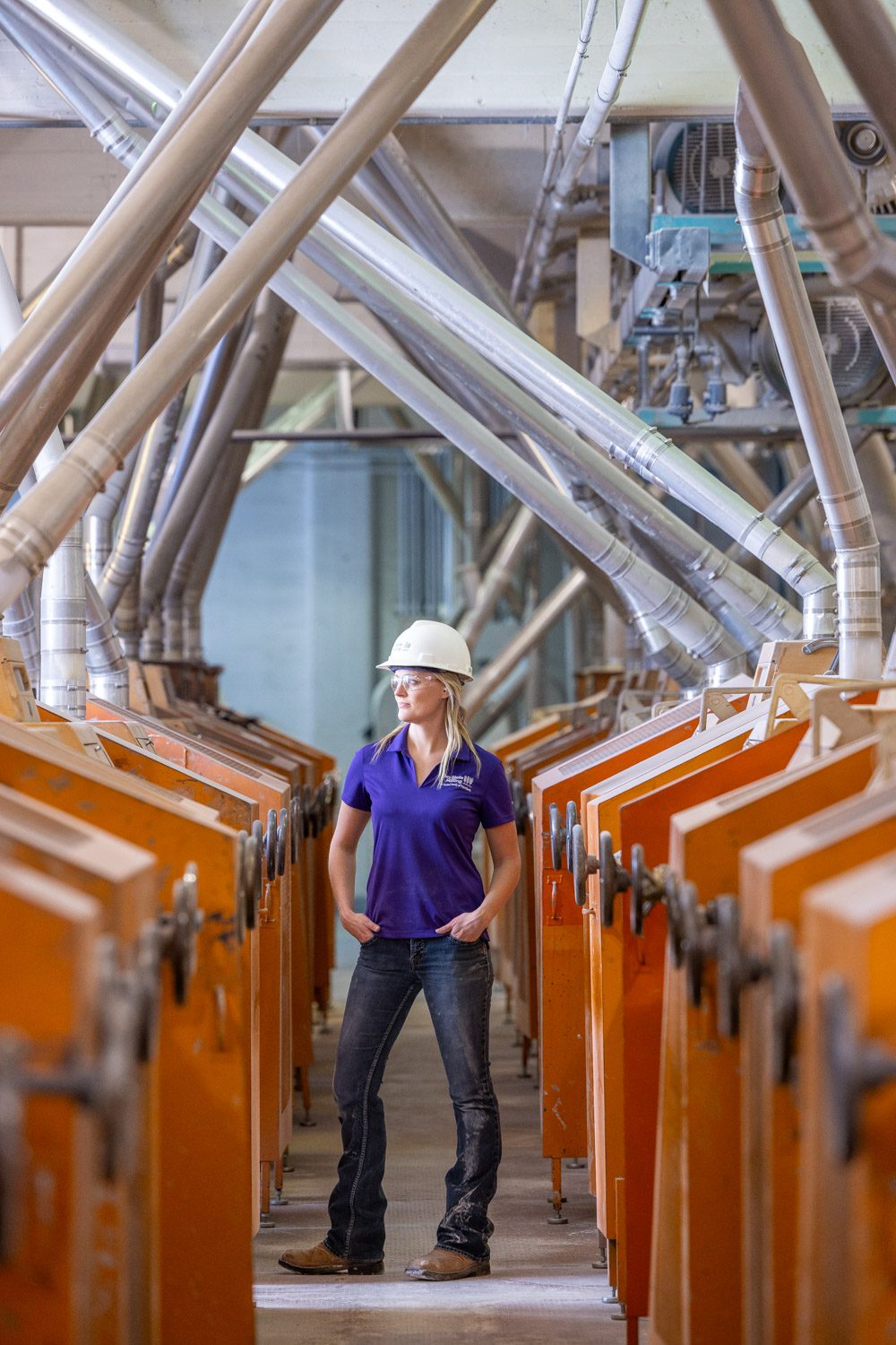 Hero image of a professional woman in a male-dominated industry.